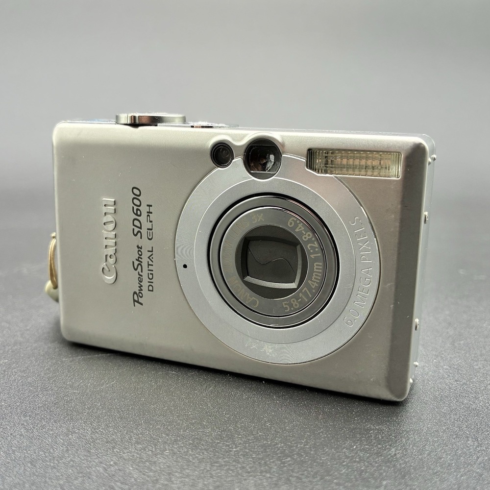 Canon PowerShot SD600 Digital ELPH 6MP Silver Camera Tested w/ Battery Case